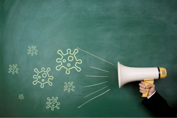 A megaphone with viruses streaming out of it