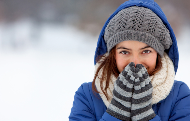 lady wearing winter clothes outside in the cold